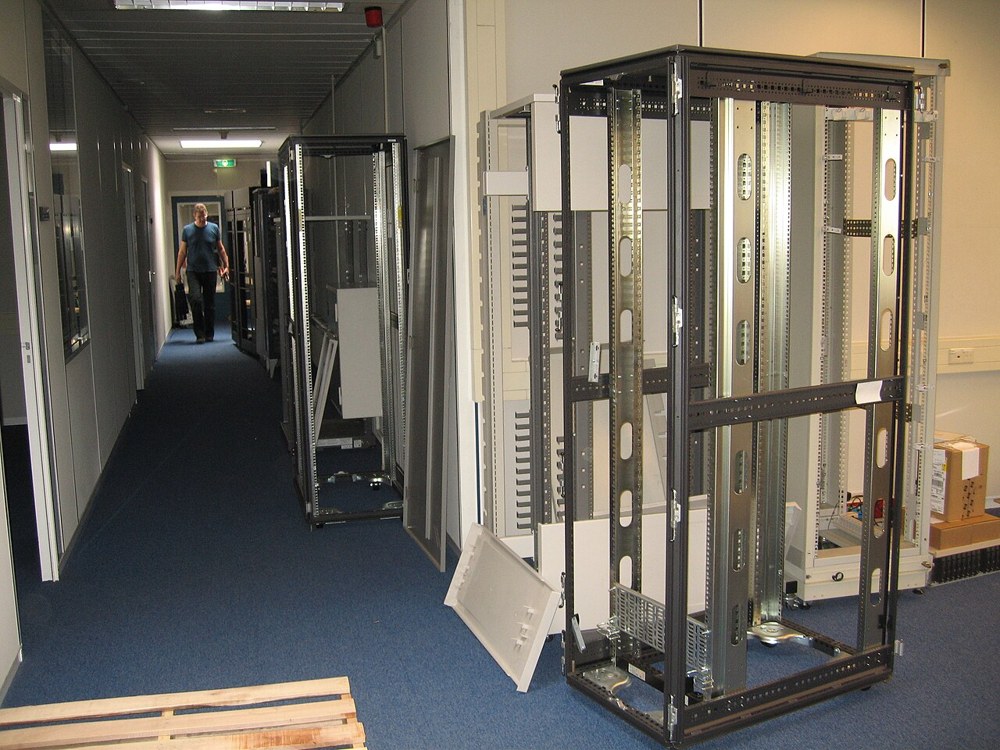 Empty server racks in a computing equipment room